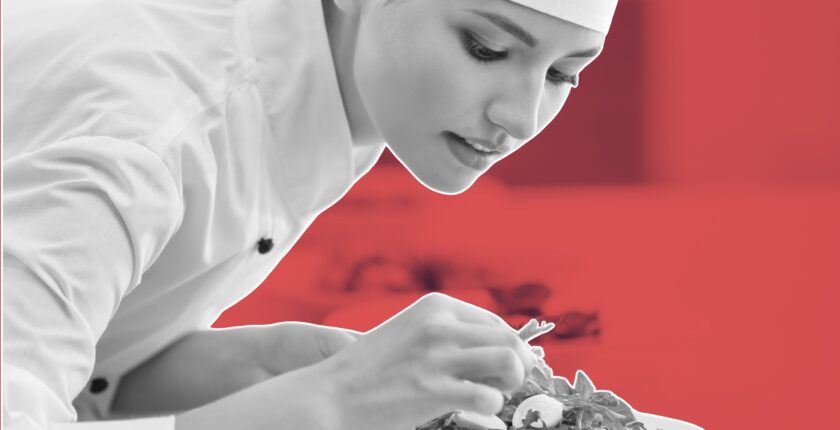 A professional chef multitasking in a modern kitchen, essential skills every chef must master