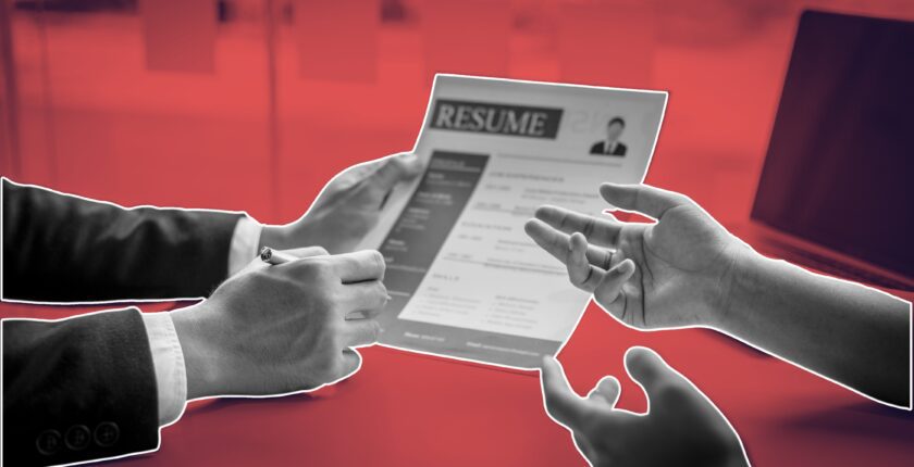 Chef planning a strategic plan for chef job search with resume and portfolio in a professional kitchen