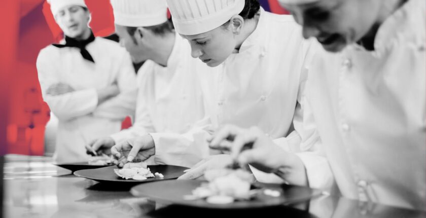 recruiter browsing chef profiles on laptop