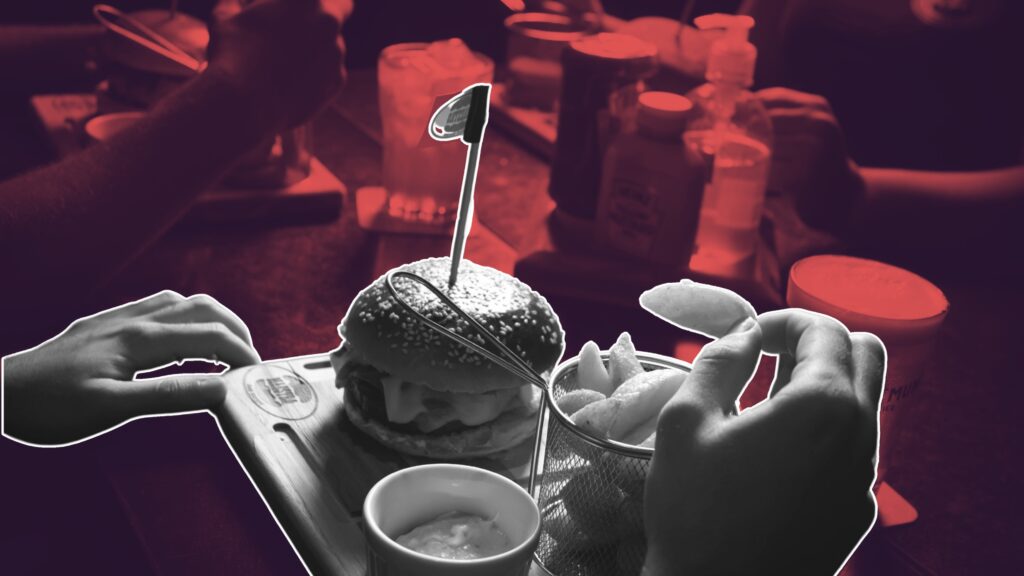 chef writing free dish storytelling prompts for chefs for food descriptions in kitchen notebook