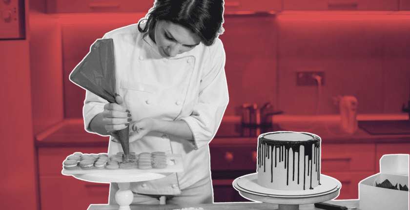 hospitality manager reviewing feedback tracker on laptop