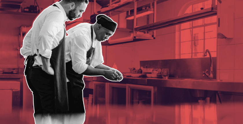 recruiter using candidate tracking spreadsheet on laptop